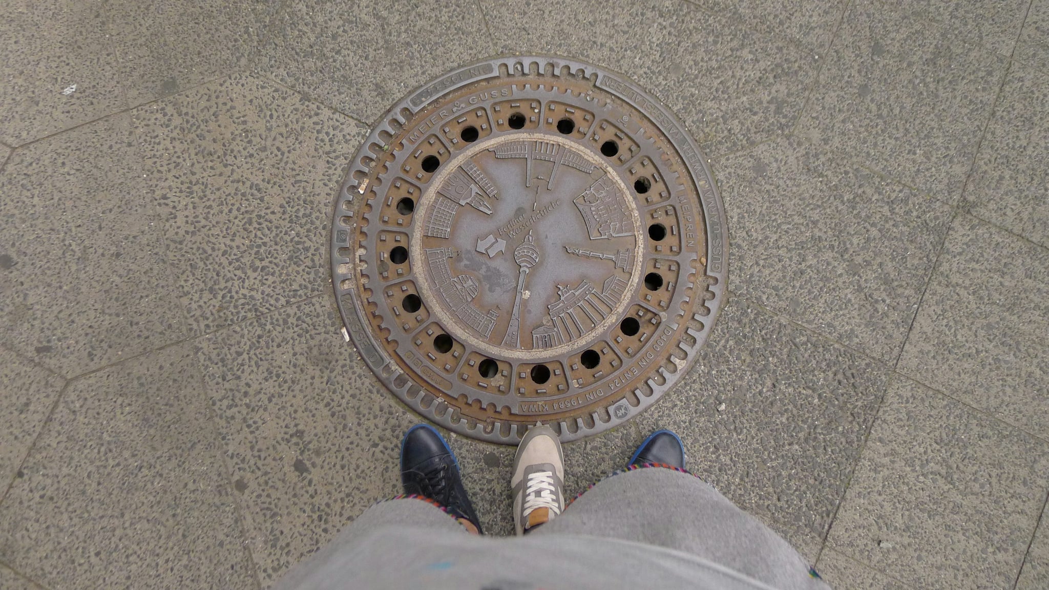 Unique Concrete Builders Manhole Cover in a road surface