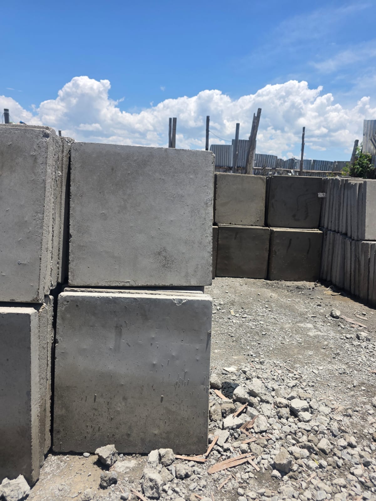 Unique Concrete Builders Solid Blocks stacked in rows at the UCB production yard in Kenya
