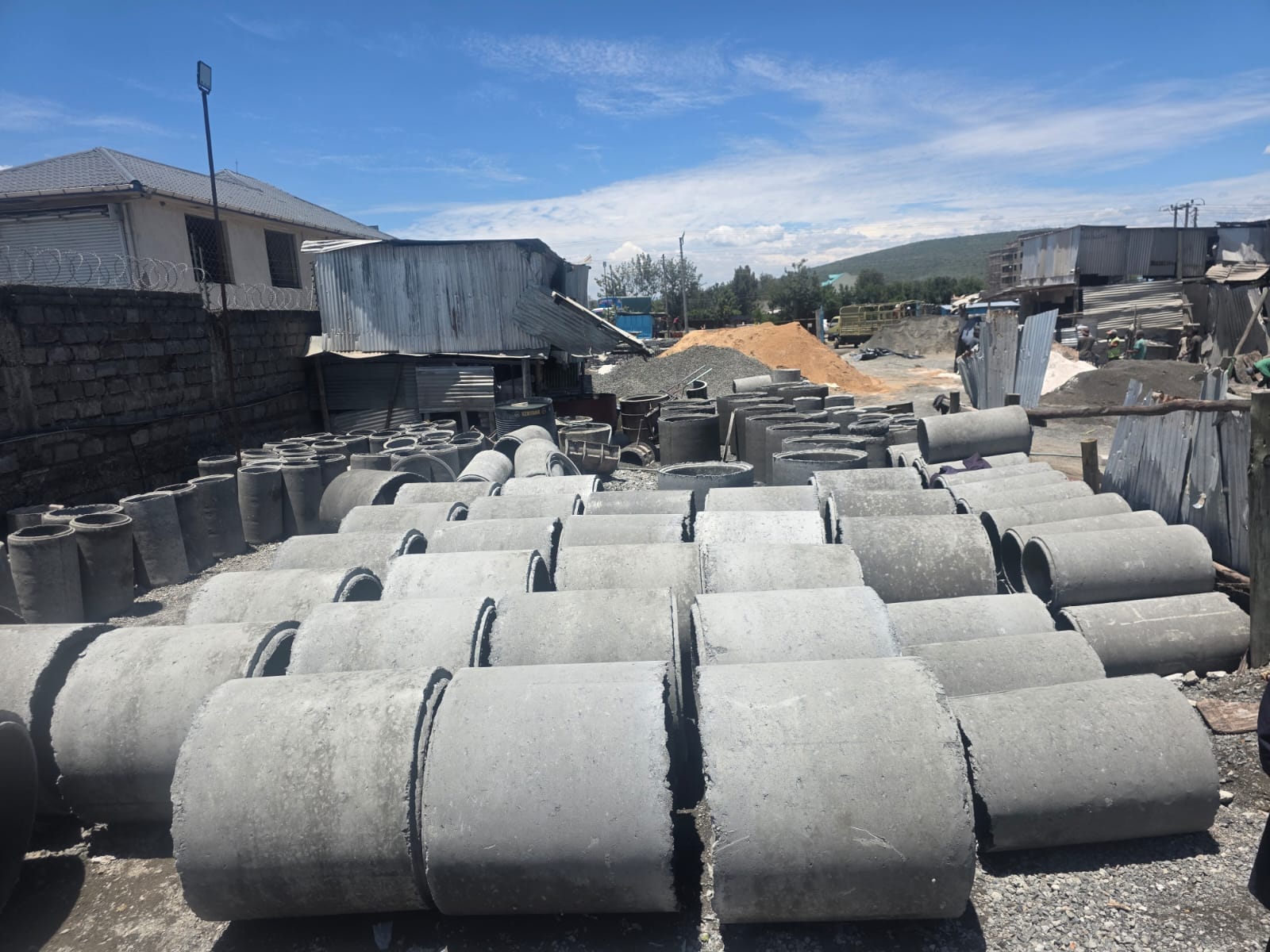 Unique Concrete Builders 300mm Concrete Culvert — precast concrete culverts stacked at UCB yard in Kenya