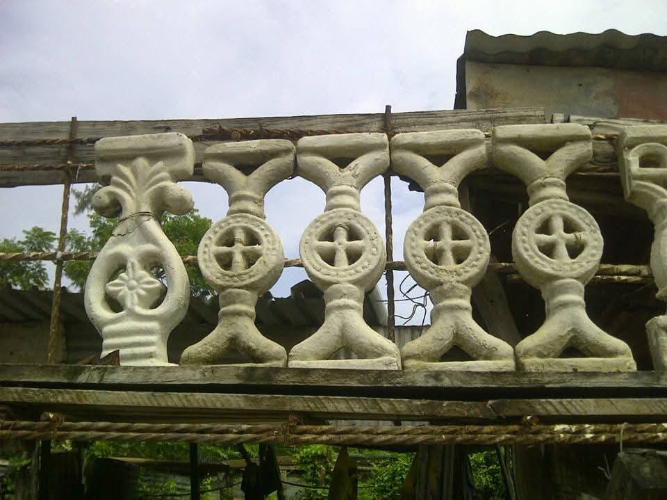 Unique Concrete Builders Balusters and Spindles — ornate concrete balusters on a railing with decorative cross and circle pattern by Unique Concrete Builders Kenya